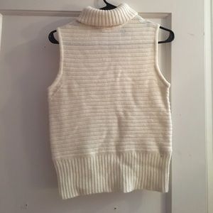 White wool sleeveless turtleneck