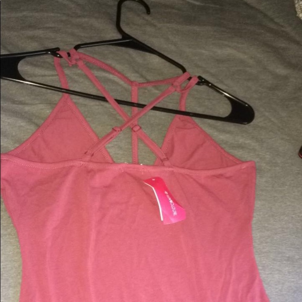 Pink knit body suit