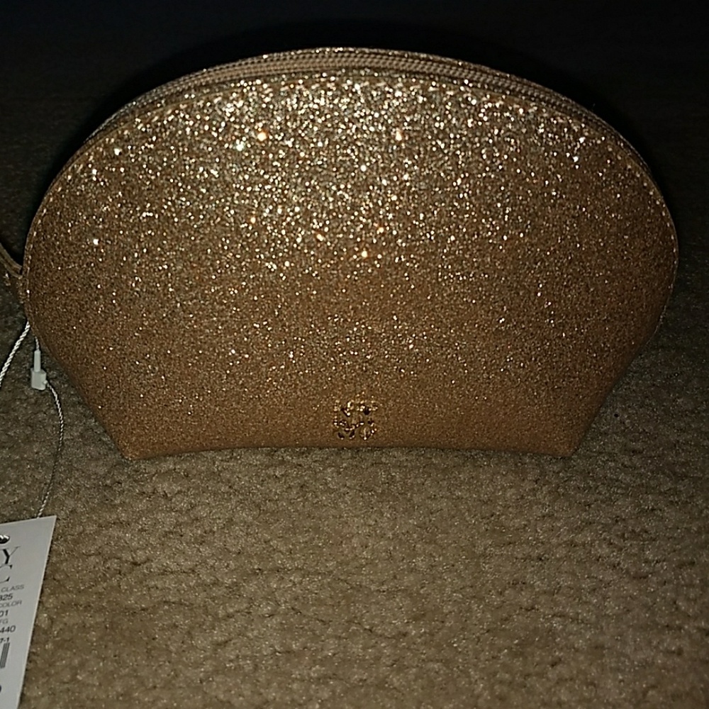 New york and company gold clutch/make up