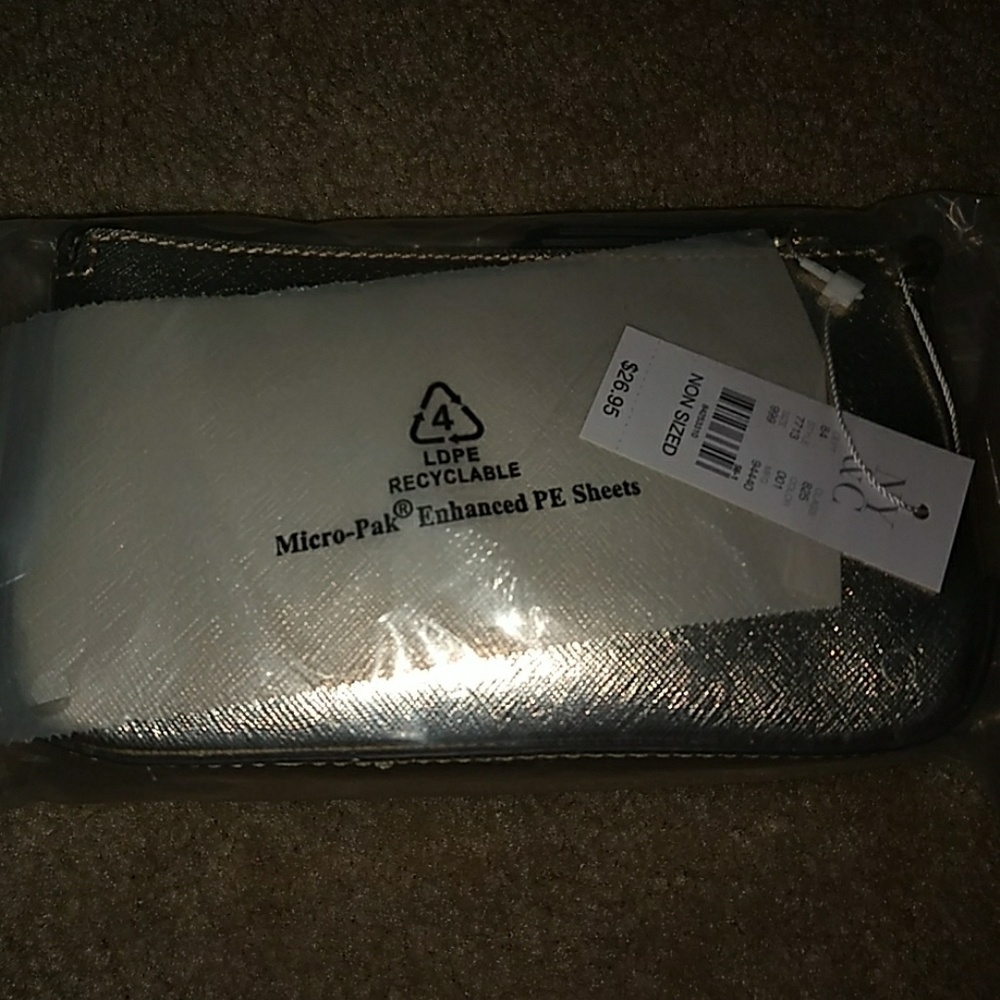 New york and company gold clutch/ wristlet