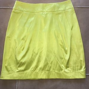 Bright yellow pleated skirt