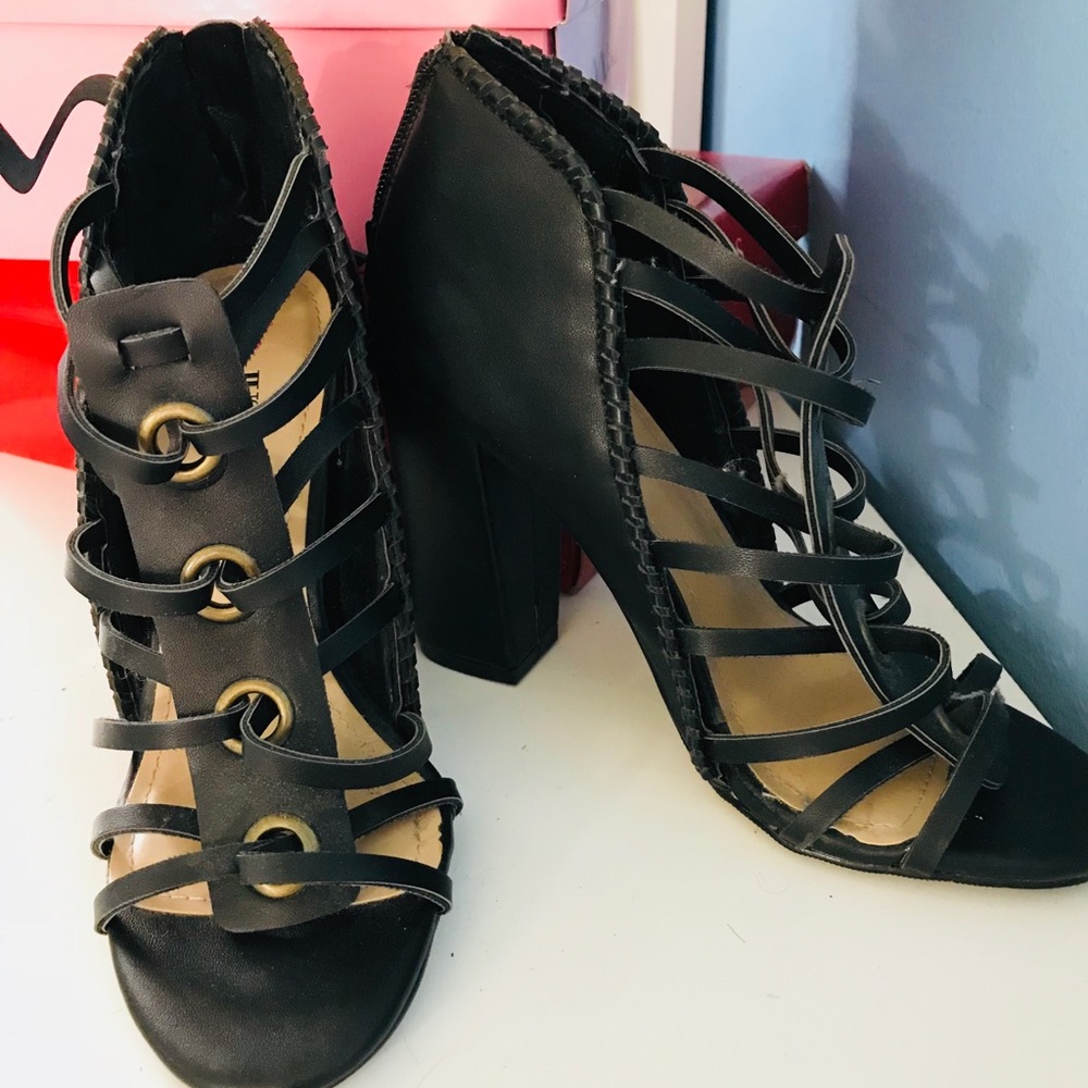 Black heel chunky straps gold details