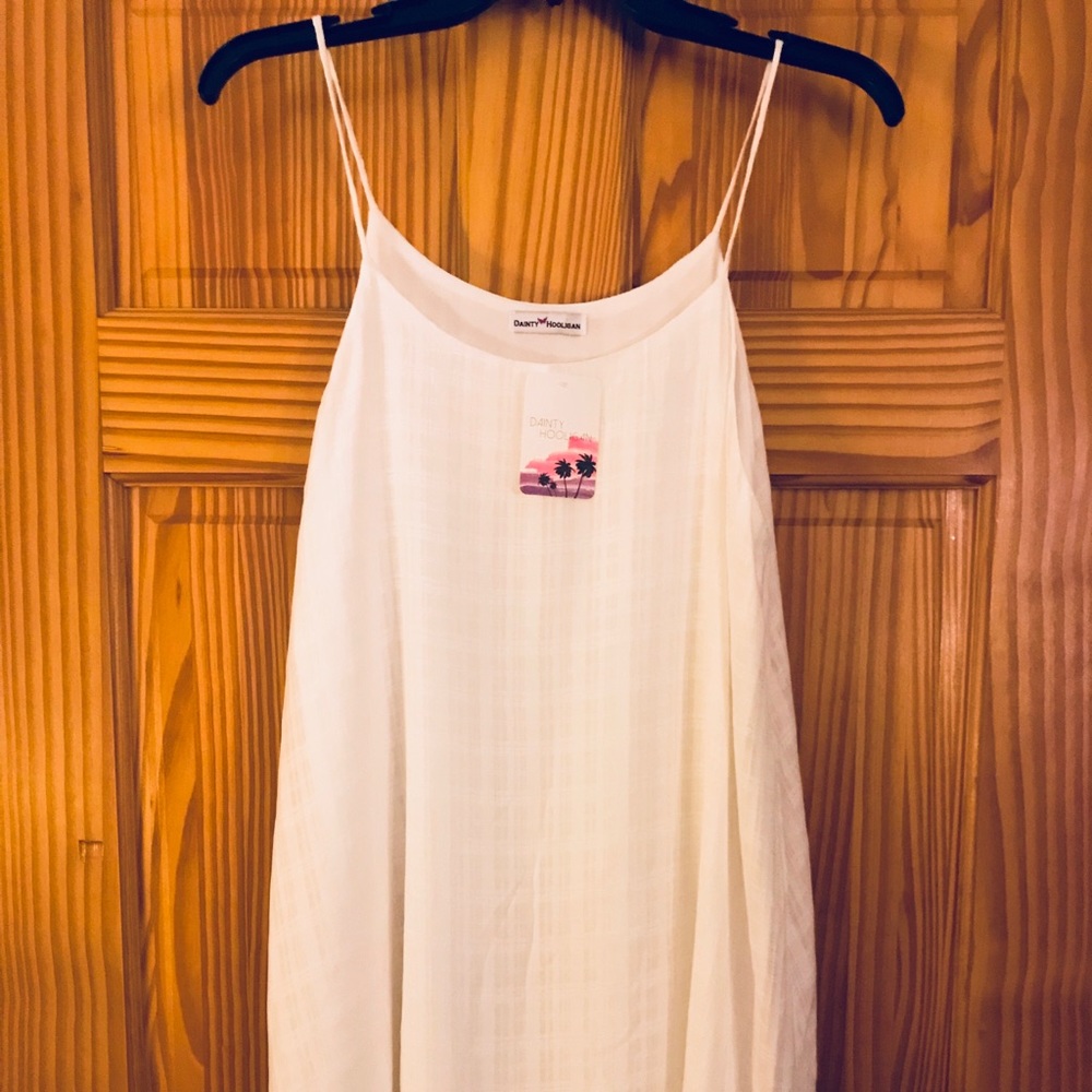 Dainty Holagan lined white sun dress.