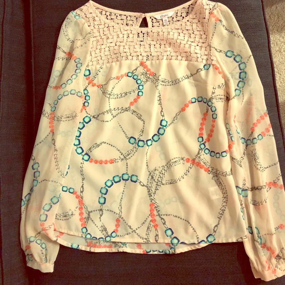 Women's beige, pink, and teal long sleeve top