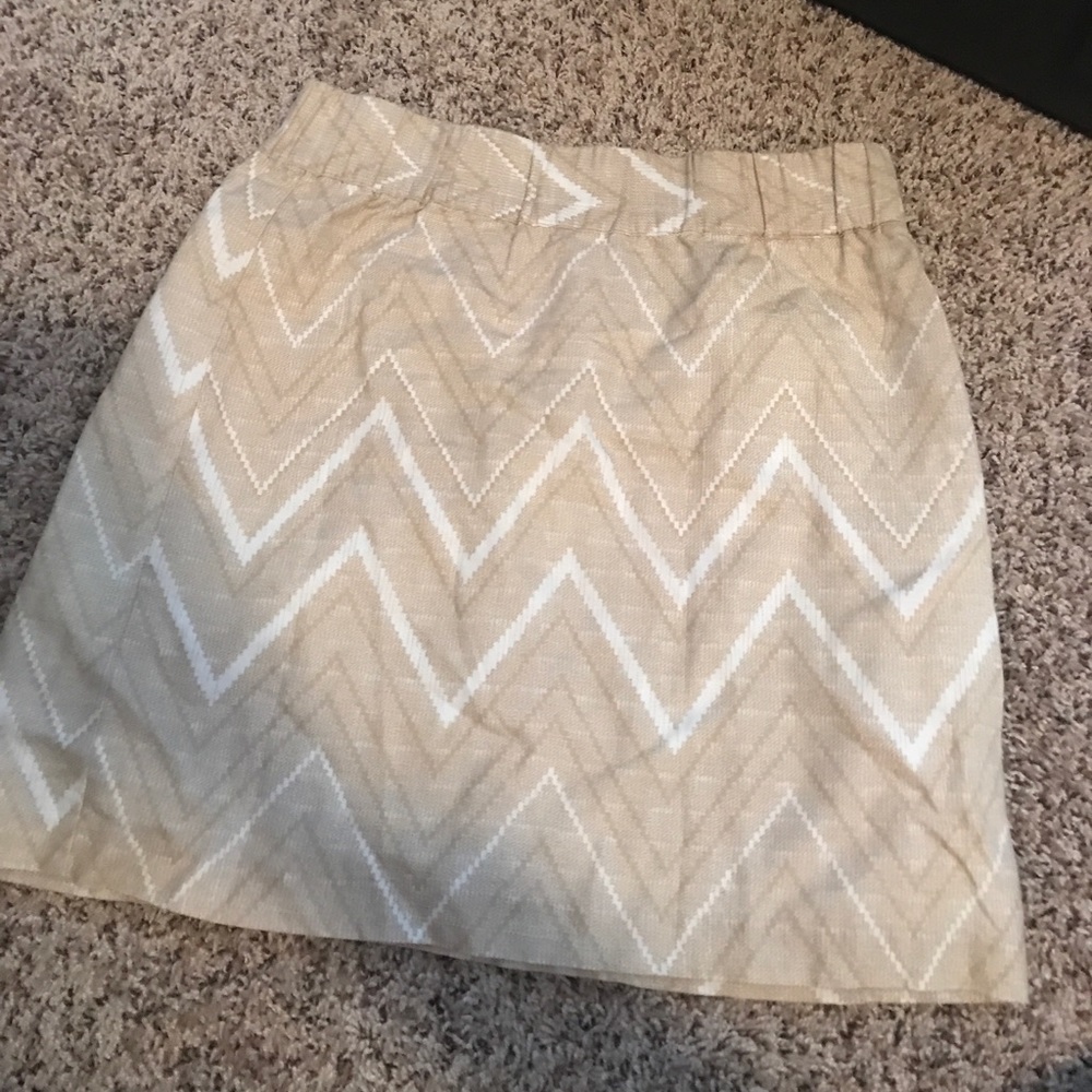 Super cute tan and white mini skirt