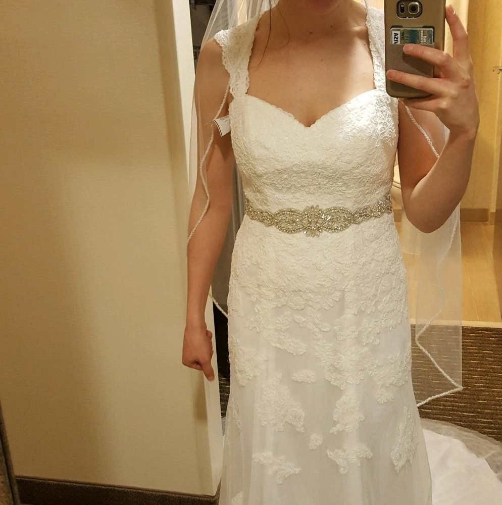 Beautiful lace keyhole wedding dress