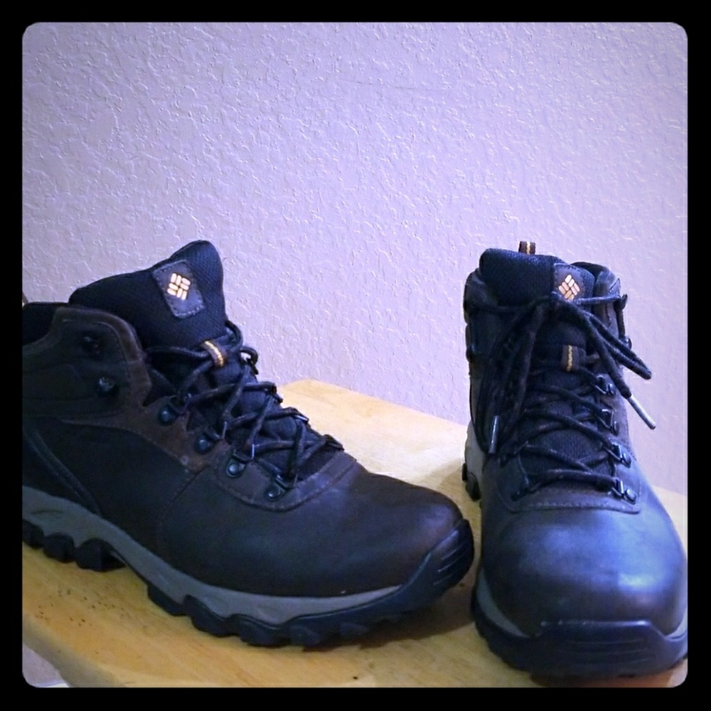A pair of brown leather Columbia hiking boots