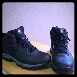 A pair of brown leather Columbia hiking boots