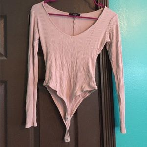 Pink one piece long sleeve shirt