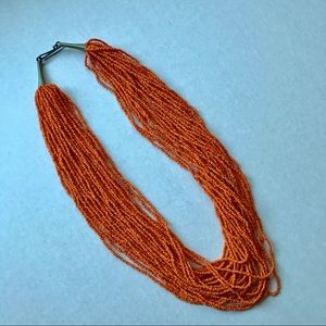 Multi strand brand new beaded necklace.