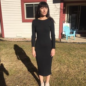 Long sleeve dress with slit in back