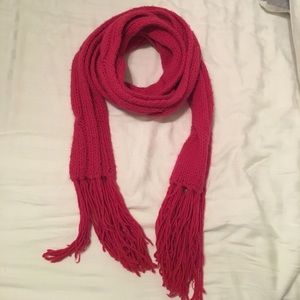 Pink cable knit scarf