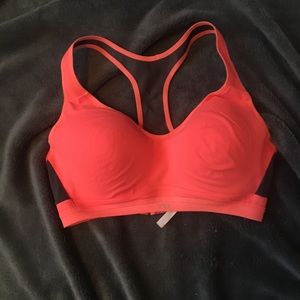 Pink and black VSX Sports bra.