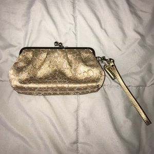 Coach clutch in gold with silver