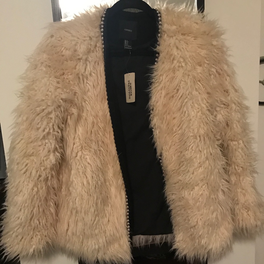 Faux fur jacket with embellishments