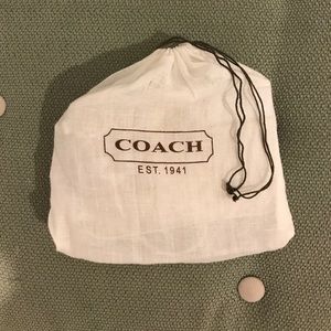 Small COACH patchwork wristlet