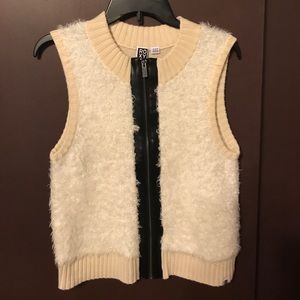 Looks amazing with faux leather pants:)