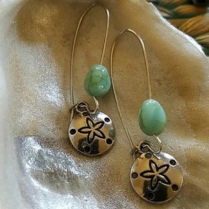 Sand dollar earings.