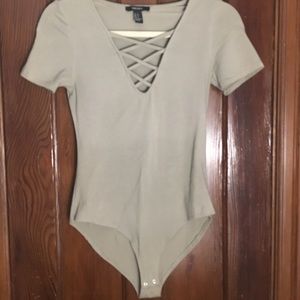 Small cross hatch front , green bodysuit