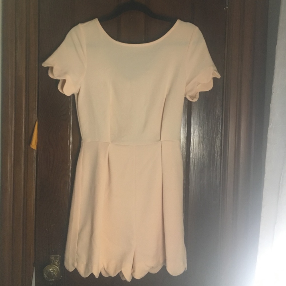 Montreu Size Medium pale pink scalloped romper