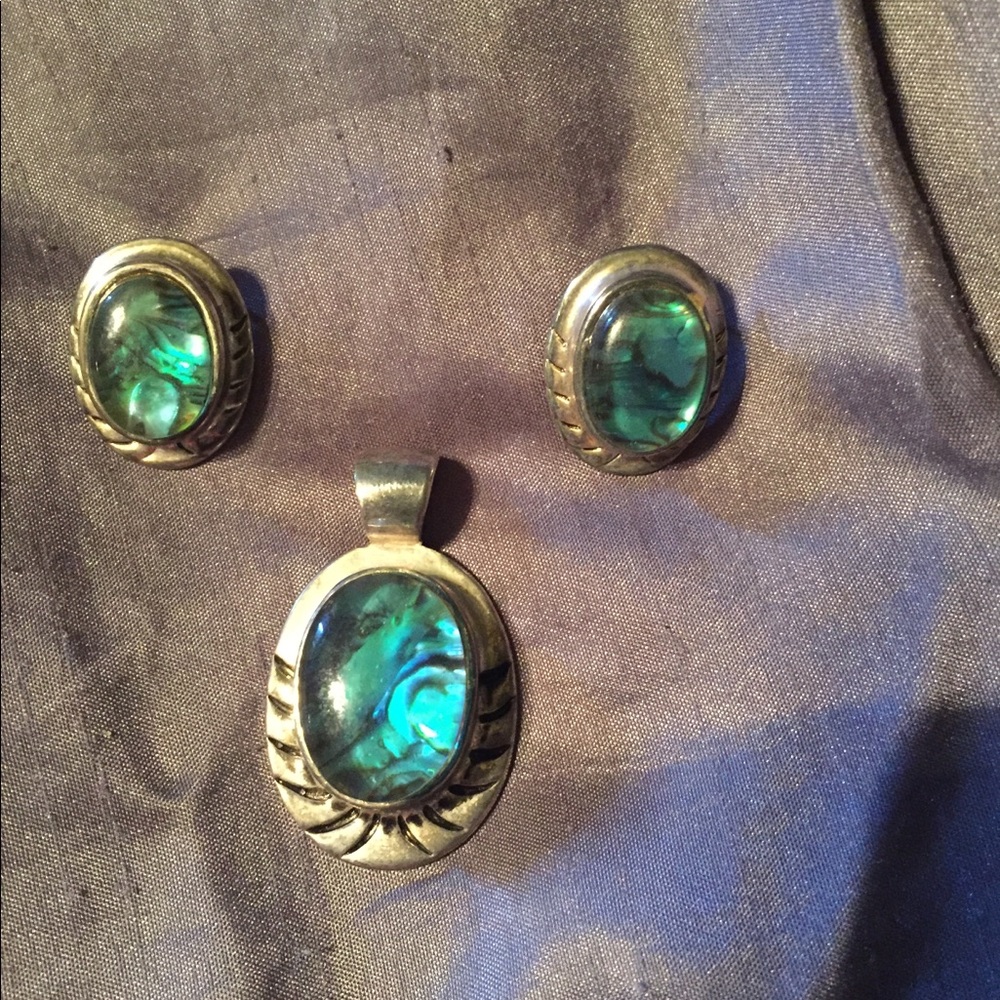 Sterling Silver earrings and pendant