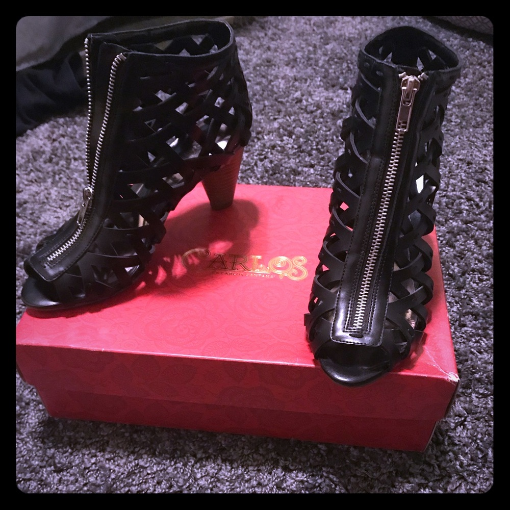 Black booty with cut outs. Size 7.5