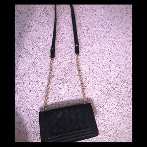 Black “quilted” side clutch