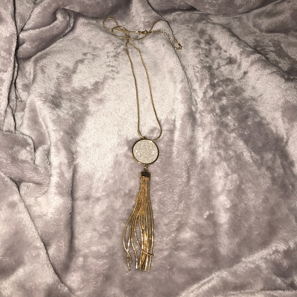 Long gold necklace