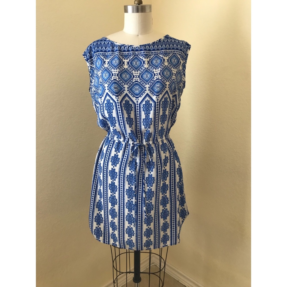 Dress with gather at waist.