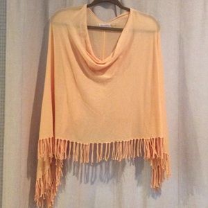 Peach colored poncho