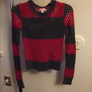 Arizona Gray with red sweater with holes