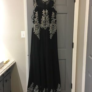 Formal gown ~ black, long and form fitting.