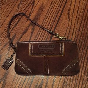 Brown leather Coach wristlet