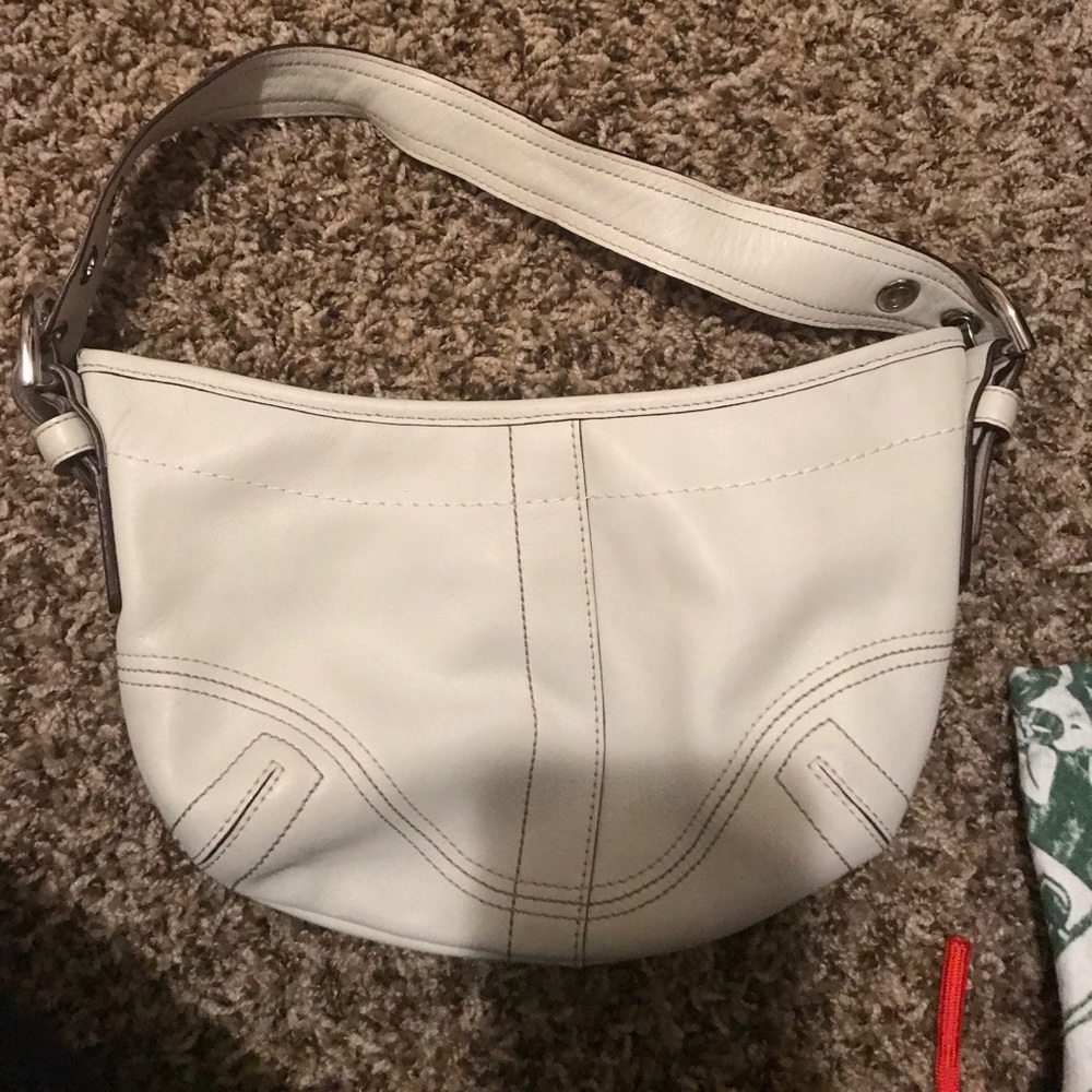 Coach cream leather purse.
