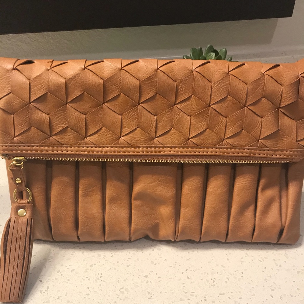 Gold and brown leather clutch