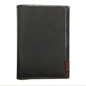 NWOT TUMI textured passport cover