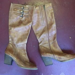 Brown knee high boots with heels