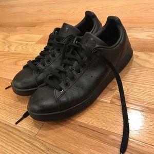 All black Adidas Stan Smiths