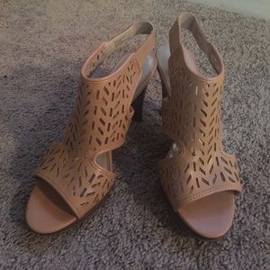 Nude tribal heels.