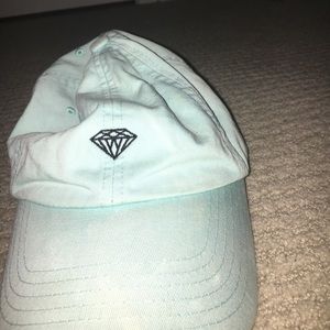 This is a diamond supply CO dad baseball hat