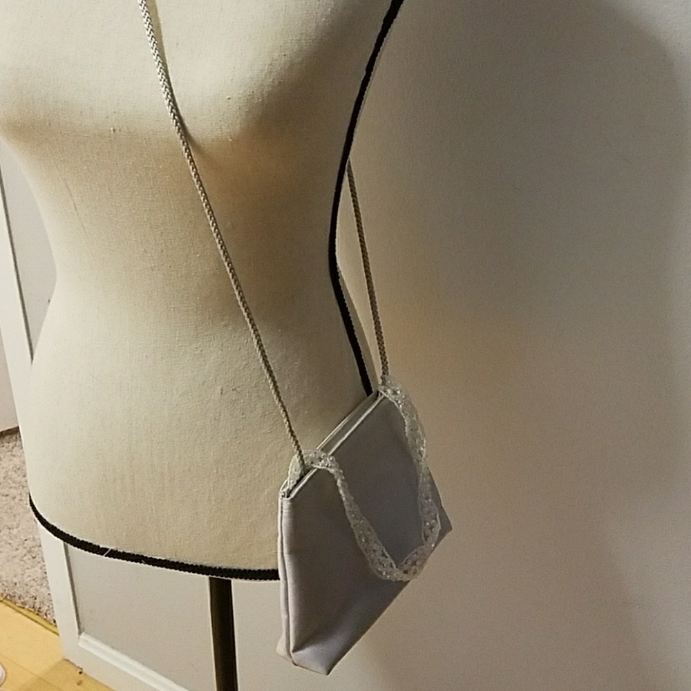 Light gray/silver satin purse