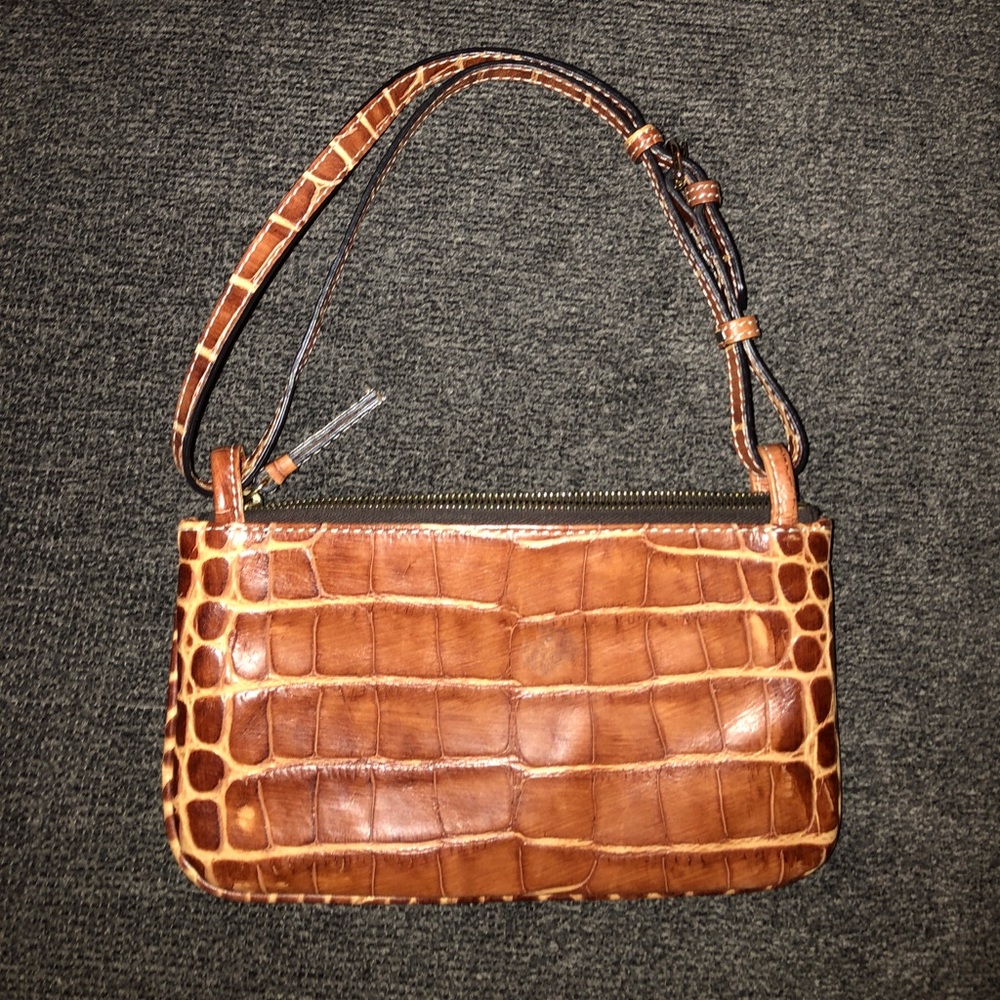 Dooney and Bourke leather clutch alligator
