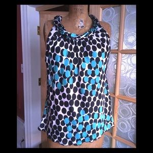 Sleeveless rolled neck black and blue spotted top