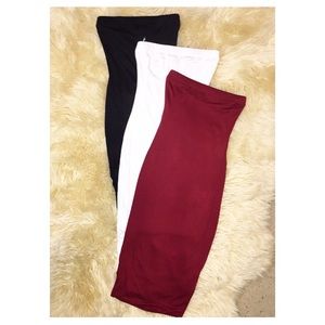 Fitted tube dress. Comes with lining, Midi length