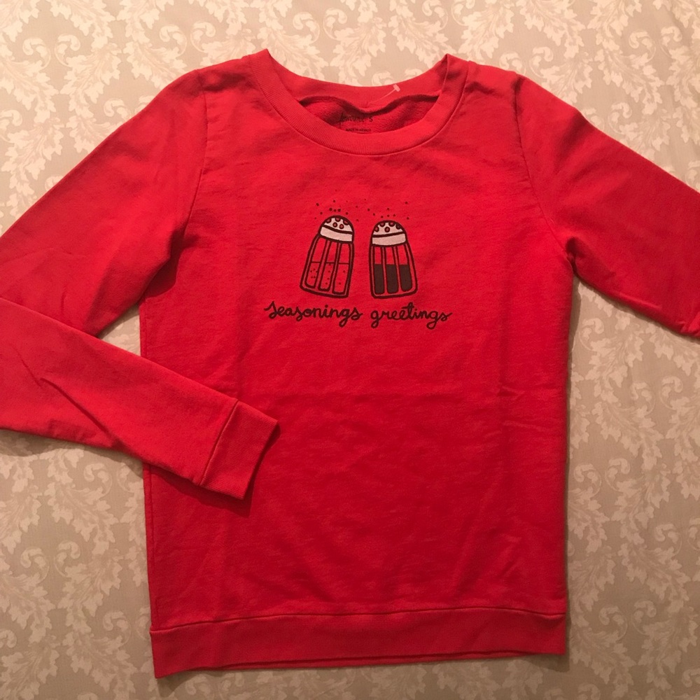 Red holiday sweater.