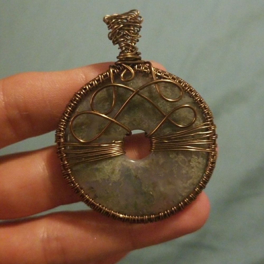 Wire wrapped donut pendant