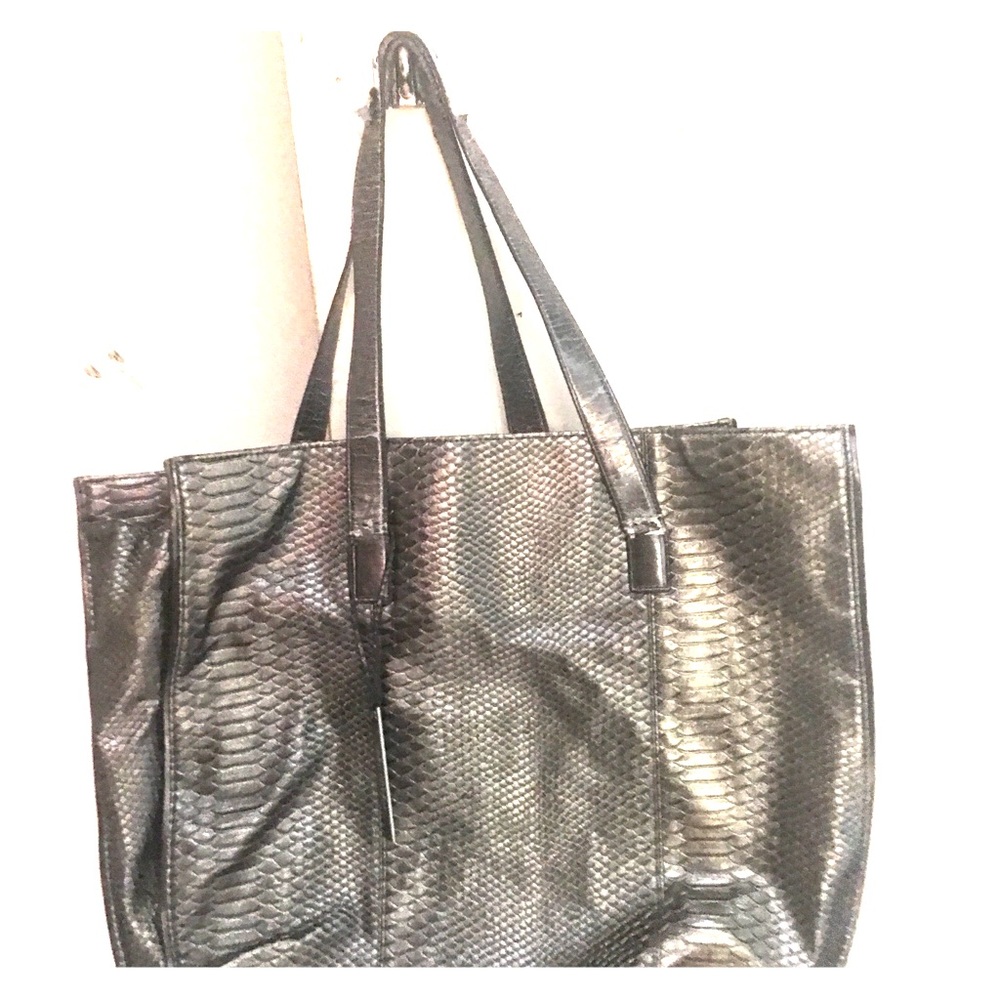 Gently used Devi Kroell handbag