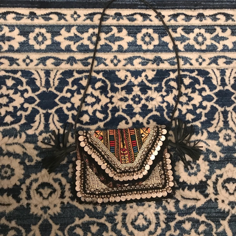 Printed Indian crossbody with black leather tassel