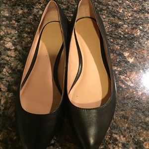 Black leather flats