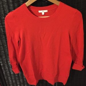 Gap orange sweater in size small